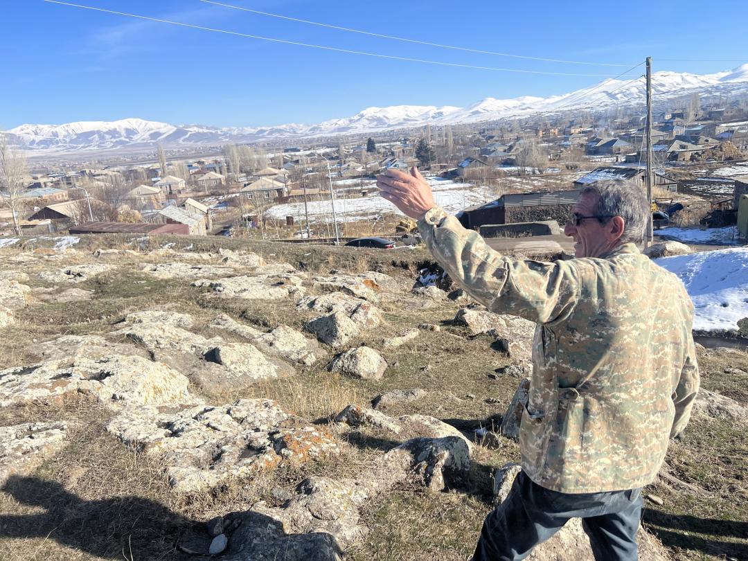 Garush Petrosyan pointing at the Azerbaijani border