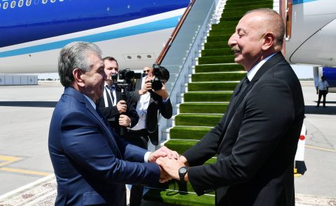Ilham Aliyev visits Uzbekistan and meets with his counterpart